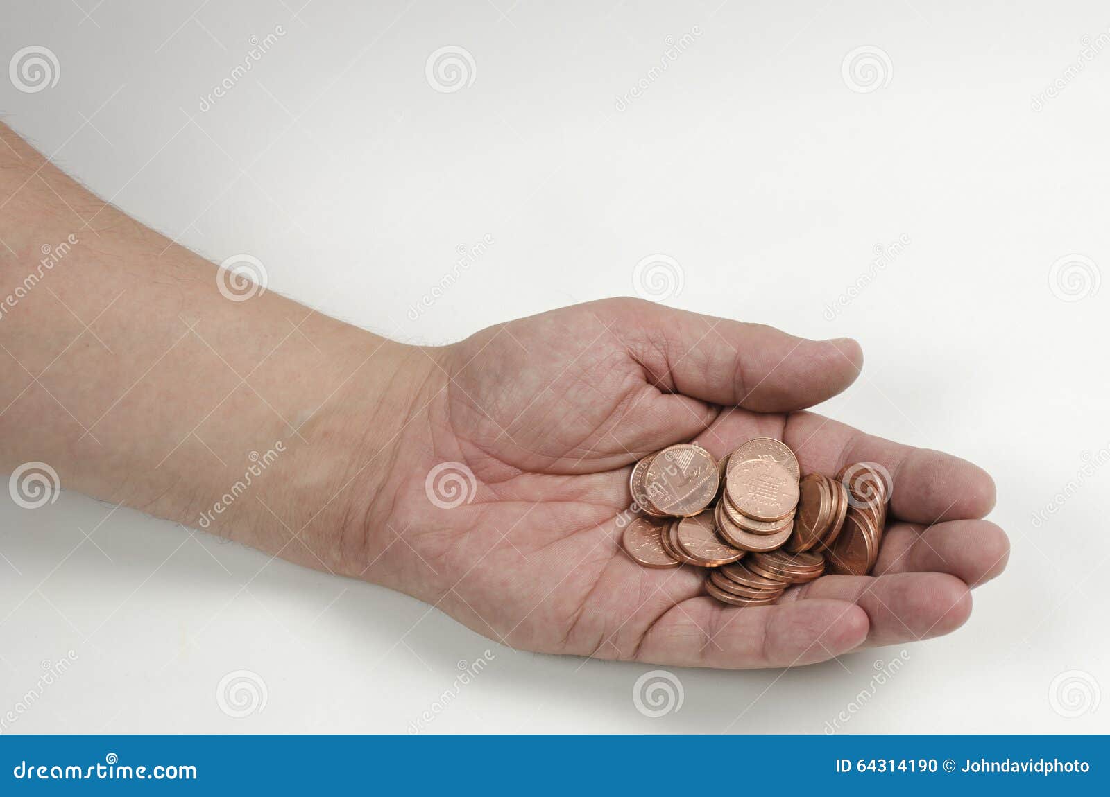 pennies-handful-shiny-64314190.jpg